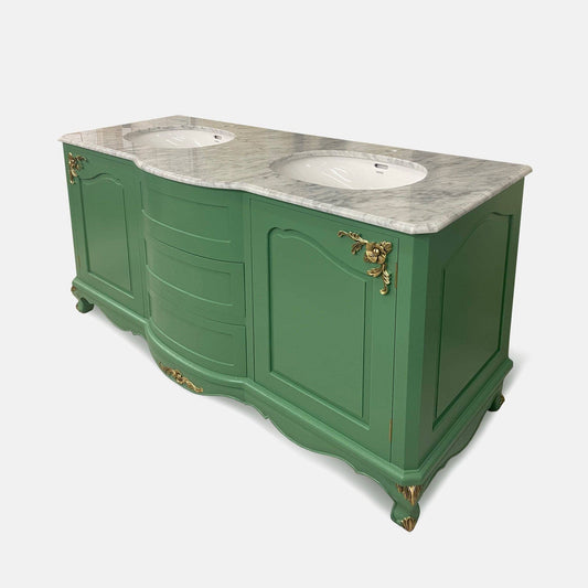 green vanity unit with gold carvings