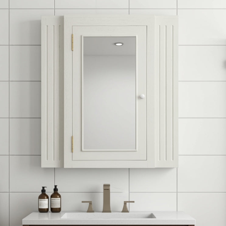 shaker bathroom medicine cabinet with mirror, hung above a bathroom sink