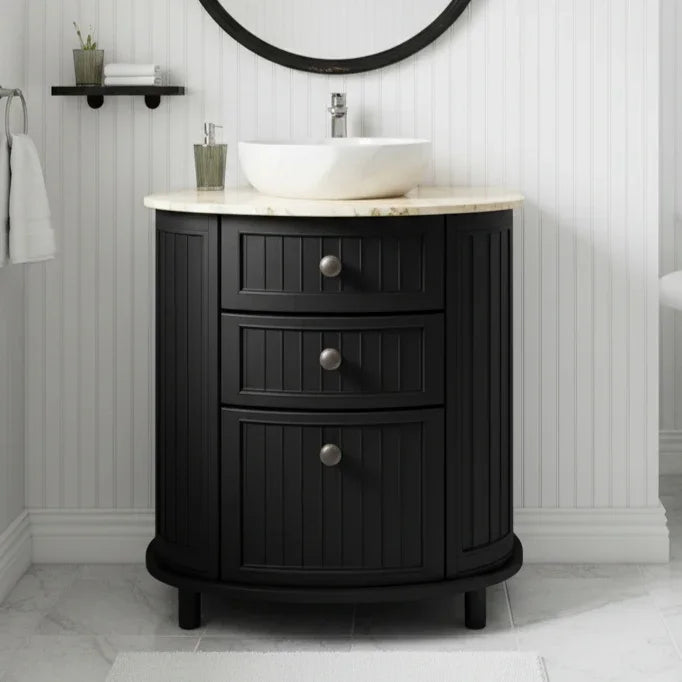Black bathroom vanity with white sink and countertop in a bathroom setting.