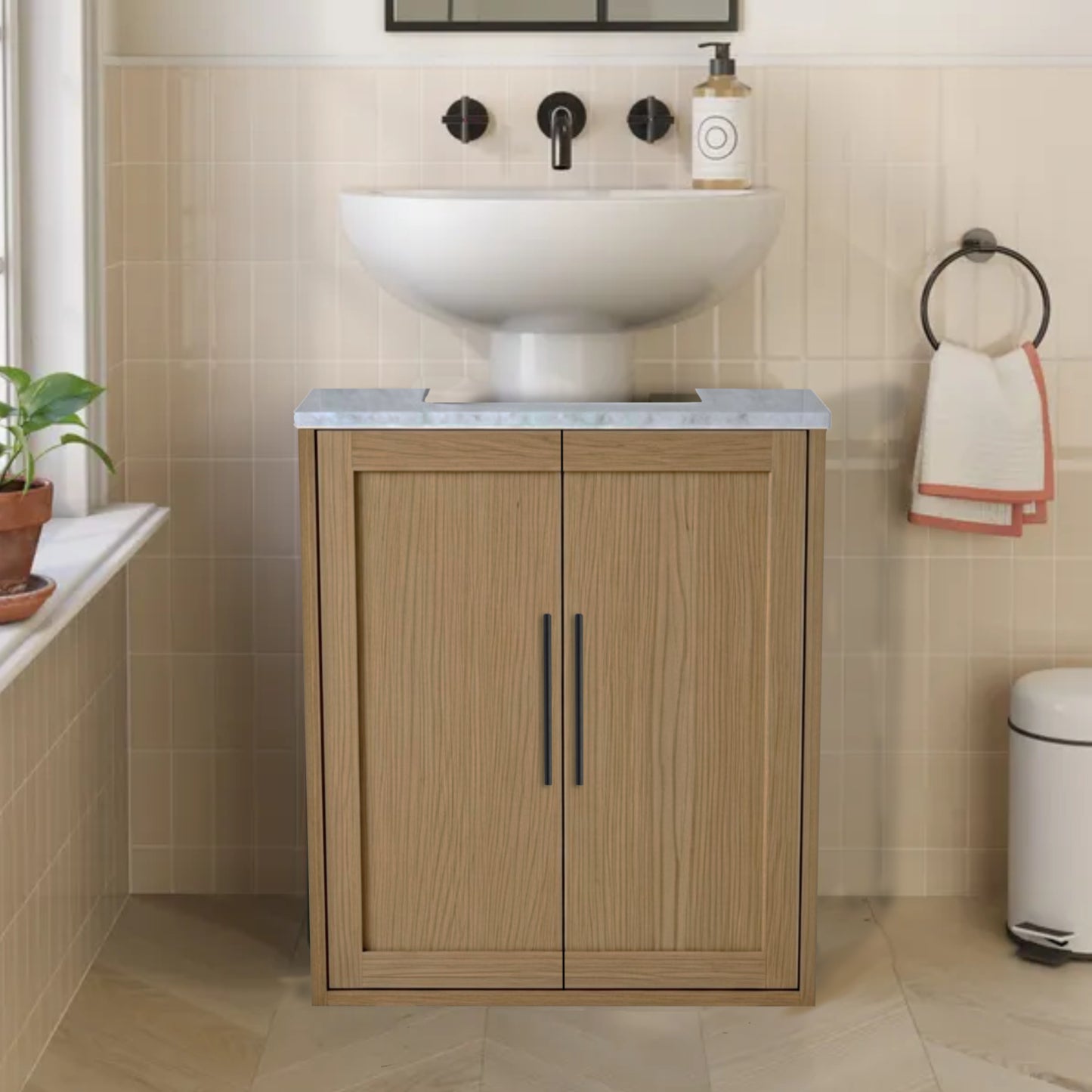 under sink wooden cabinet, white sink, and tiled walls.