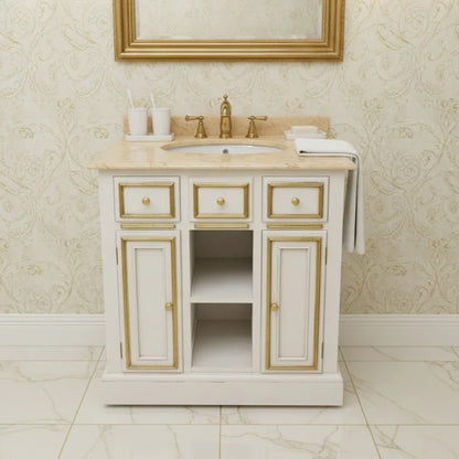 Bathroom vanity with marble countertop and gold accents in a bathroom setting.