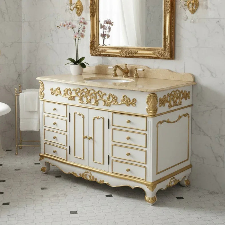 Decorative bathroom vanity with gold accents in a marble bathroom setting