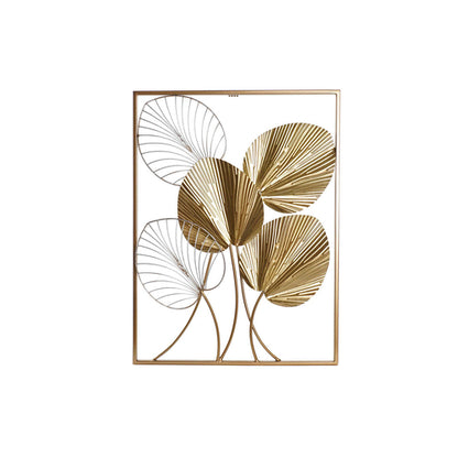 Decorative wall art with gold leaf designs on a white background