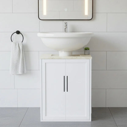 Bathroom vanity with white sink and cabinet against a tiled wall.