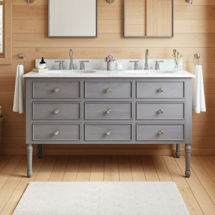 Gray vanity with white countertop in a bathroom setting
