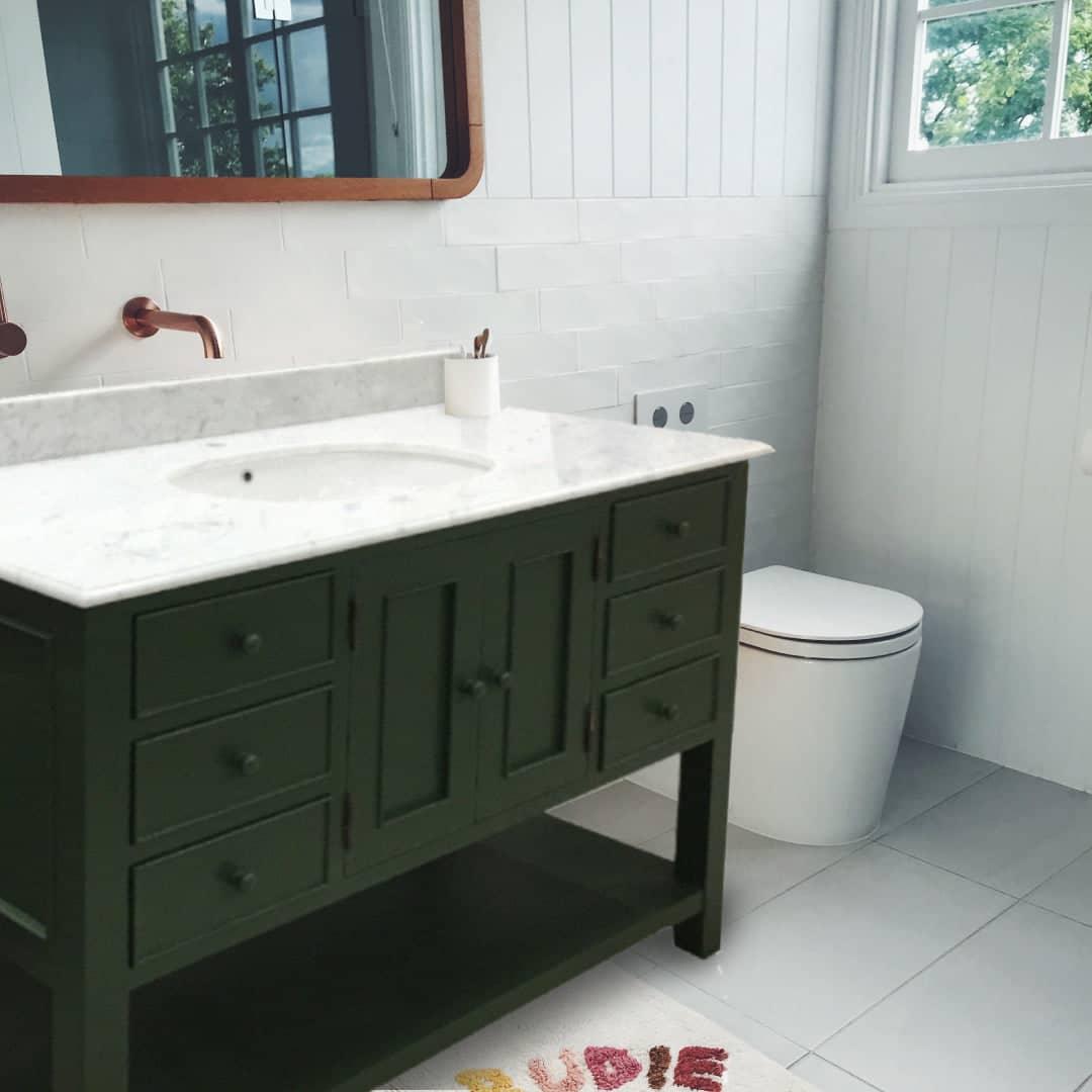 white marble sink sink bathroom vanity unit with open shelf at the bottom