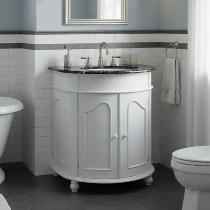 Bathroom with a white vanity unit, sink, and mirror.