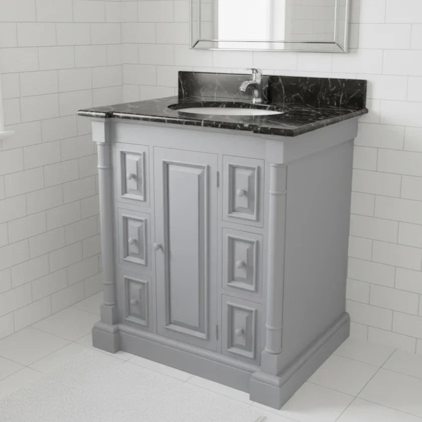 Gray bathroom vanity with black marble countertop and sink against a white tiled wall.