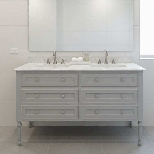 Gray bathroom vanity with white countertop and marble-like finish in a modern bathroom setting.