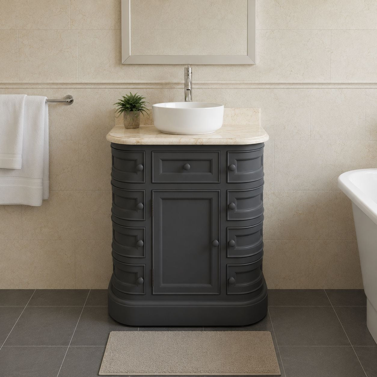 Bathroom vanity with sink and cabinet in a tiled bathroom setting