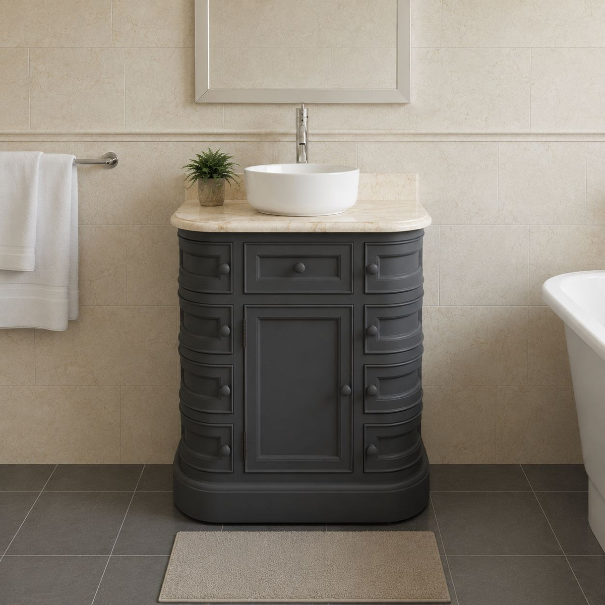 Bathroom vanity with sink and cabinet in a tiled bathroom setting