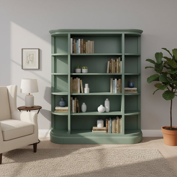 Green bookshelf in a room with a chair and plant