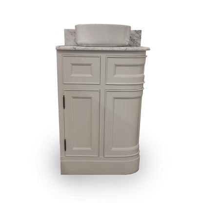 Bathroom vanity with marble countertop on a white background