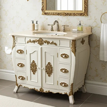 Decorative bathroom vanity with marble countertop, sink, and ornate gold details.