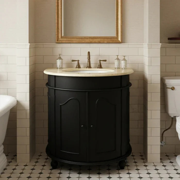 Bathroom with black vanity unit, sink, and decorative mirror.