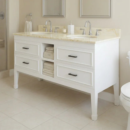Bathroom vanity with marble countertop and towels in a tiled bathroom.