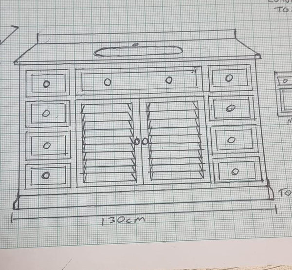 Hand-drawn cabinet design on graph paper with dimensions
