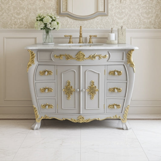Decorative bathroom vanity with gold accents in a stylish room.