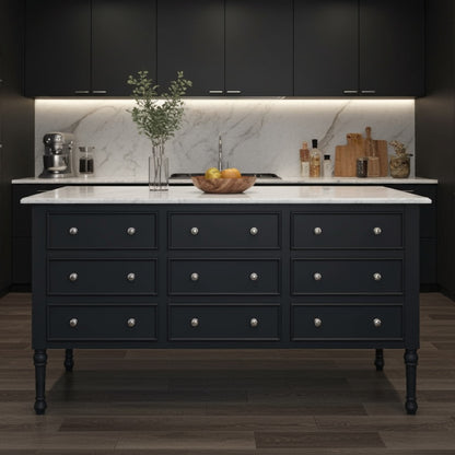 Modern kitchen with dark cabinets, marble backsplash, and a central island.