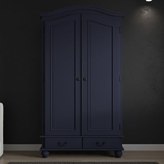 Dark blue wardrobe against a black wall