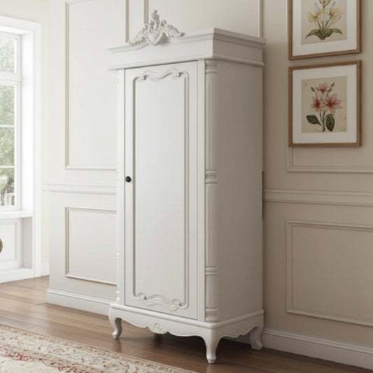 White wardrobe in a room with decorative wall art