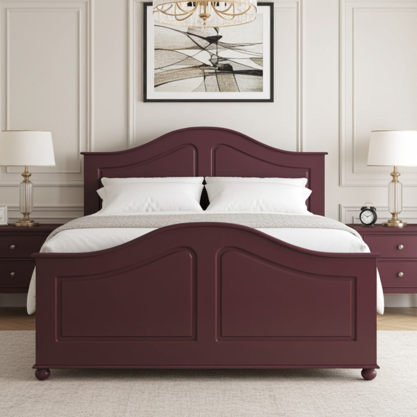 Maroon bed frame with white bedding in a bedroom setting.