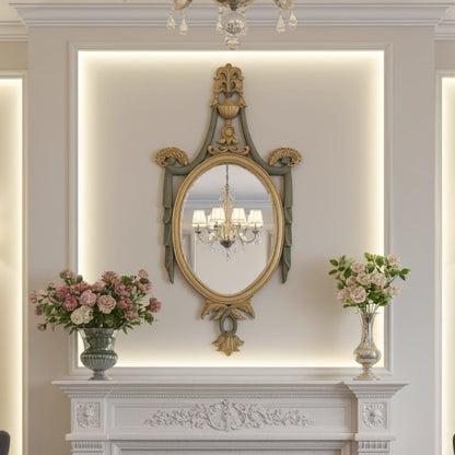 Decorative mirror with floral arrangements on a mantelpiece in a stylish room.