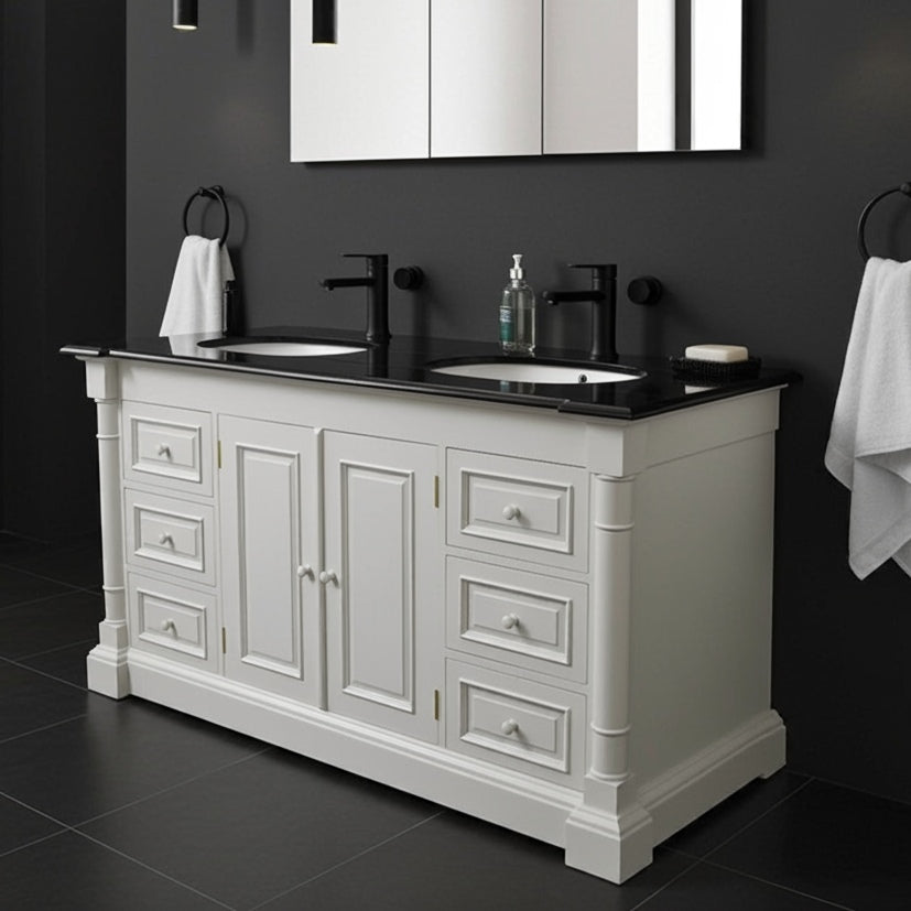 Bathroom vanity with double sink, black countertop, and white cabinets against a dark wall.