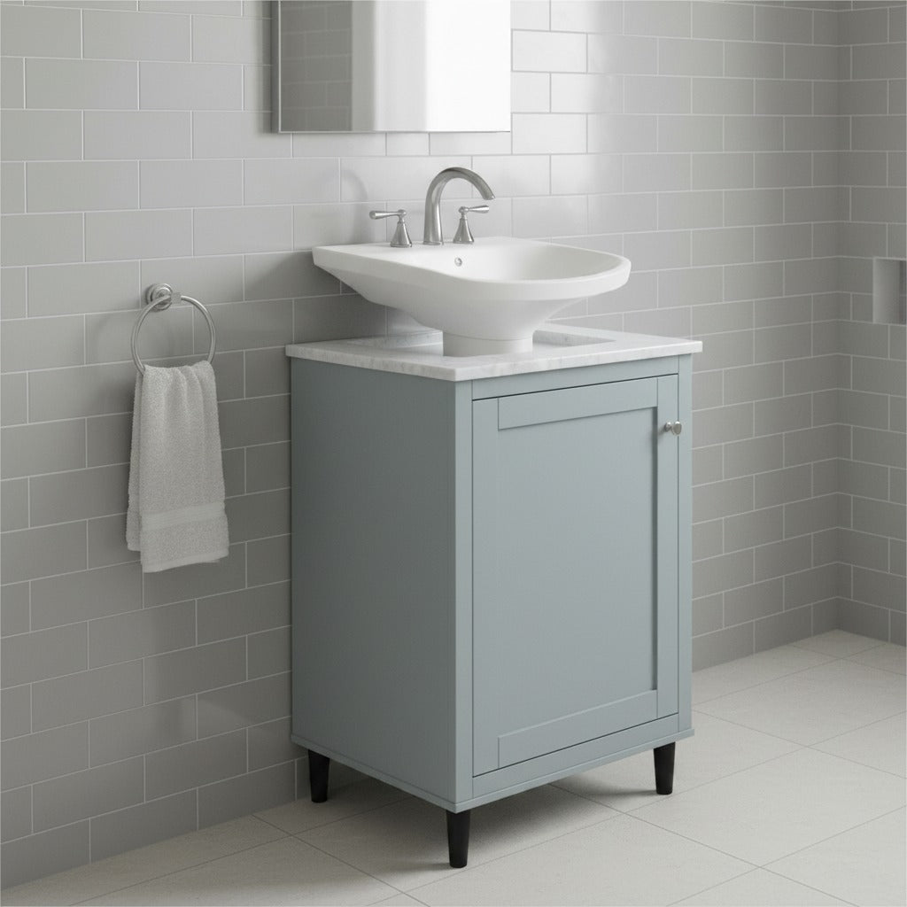 Bathroom vanity with sink against a tiled wall