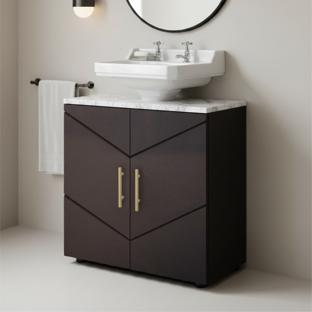 Bathroom vanity with white sink and marble countertop against a beige wall.
