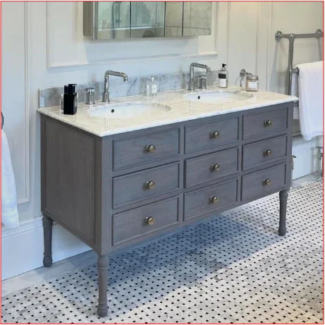 Bathroom vanity with two sinks and multiple drawers in a bathroom setting.