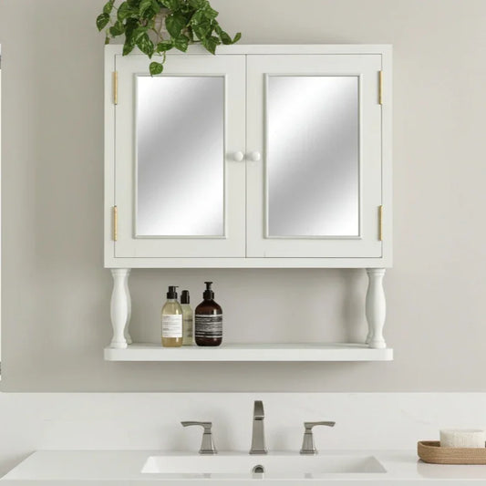 White bathroom cabinet with mirror above a sink, featuring bottles and a plant.