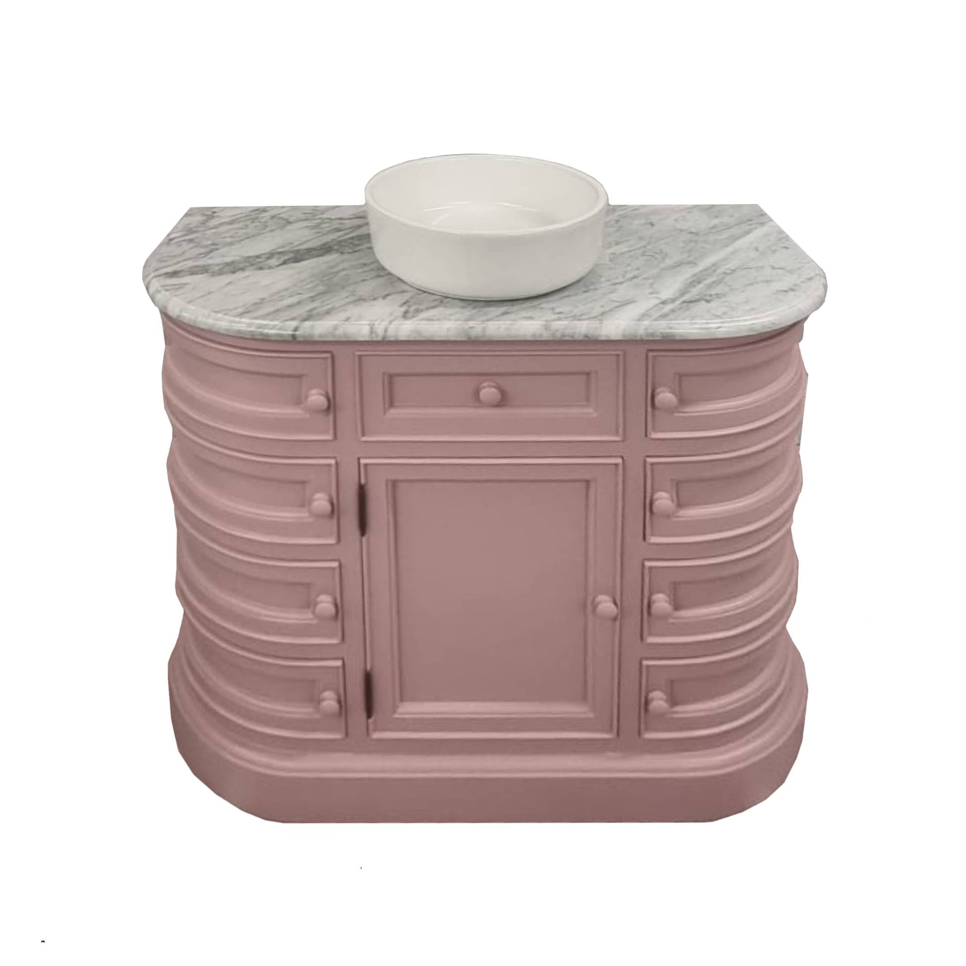 Pink bathroom vanity with marble countertop and white basin on a white background