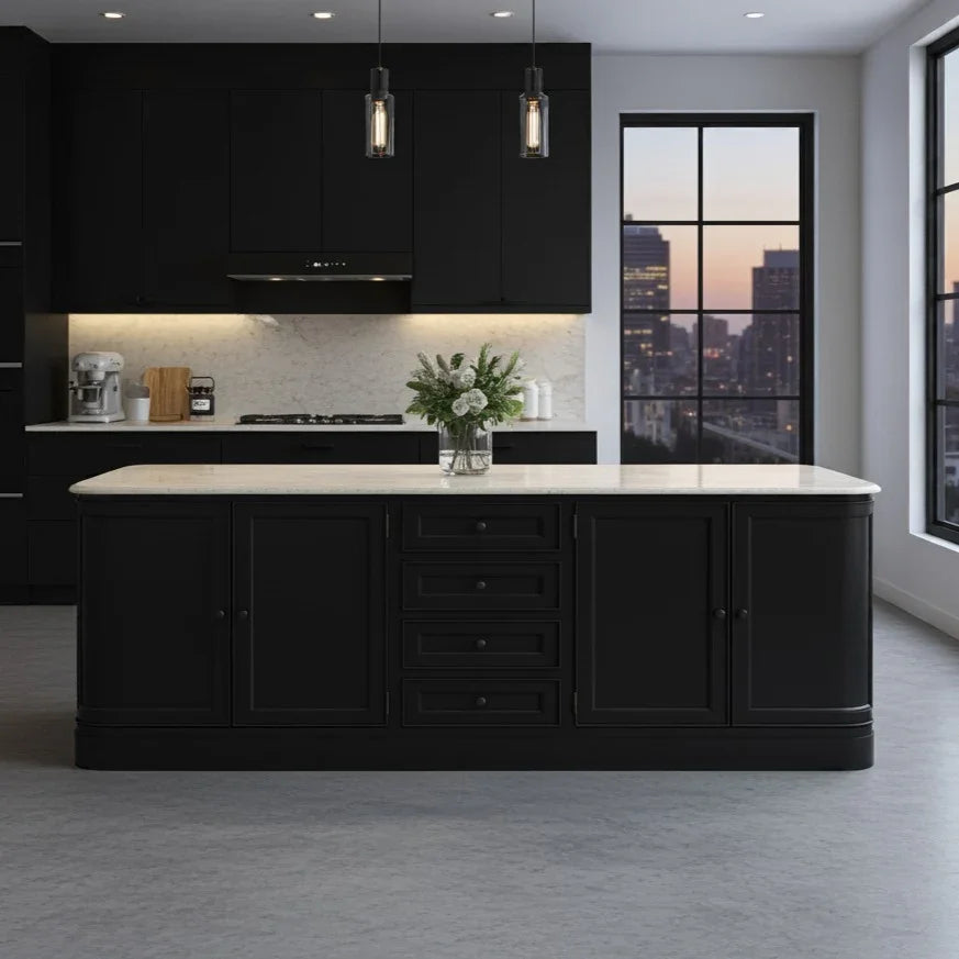 Modern kitchen with black cabinetry and a large island.
