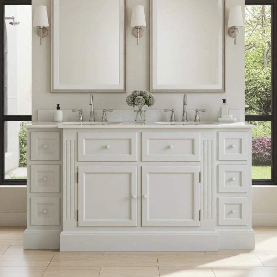 White bathroom vanity with mirrors and decorative elements in a bright room.