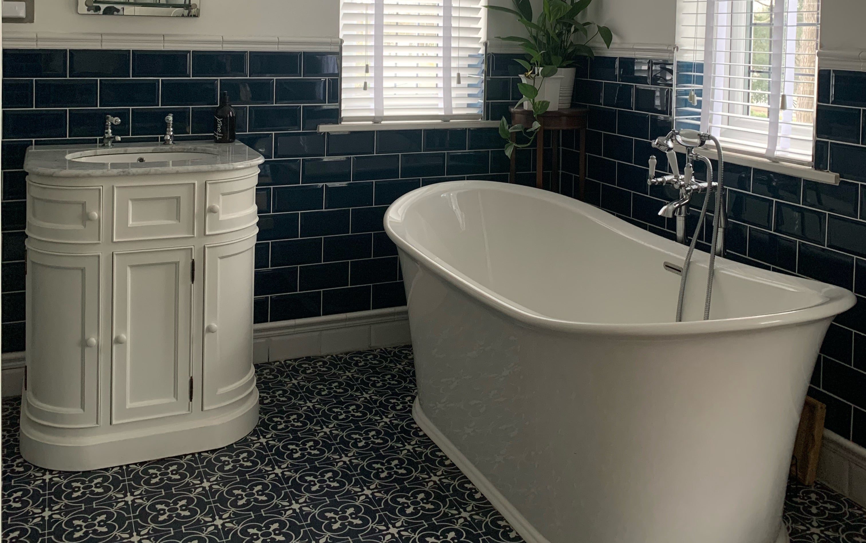 whitee vanity unit in blue bathroom