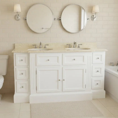 Bathroom vanity with two round mirrors, lights, and a bathtub.