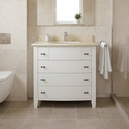 Bathroom vanity with marble countertop and sink in a tiled bathroom.