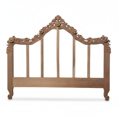 Heavily carved mahodany headboard