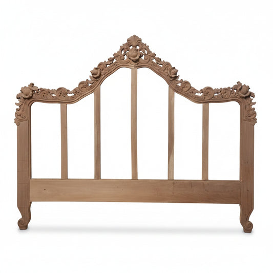 Heavily carved mahodany headboard