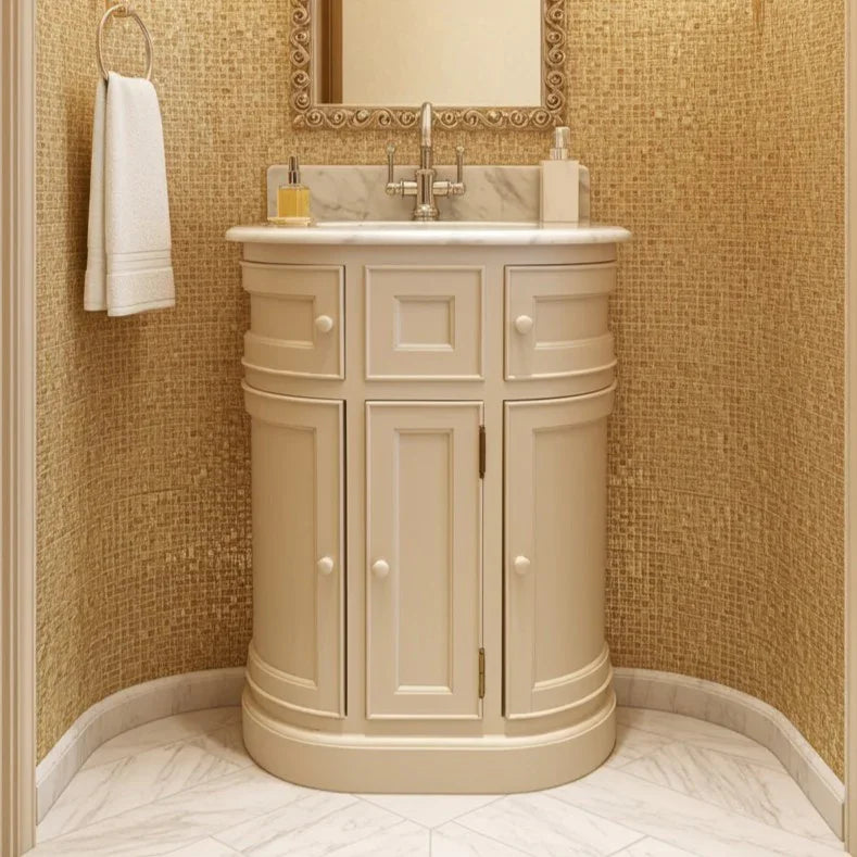 Beige bathroom vanity with sink against a textured beige wall.