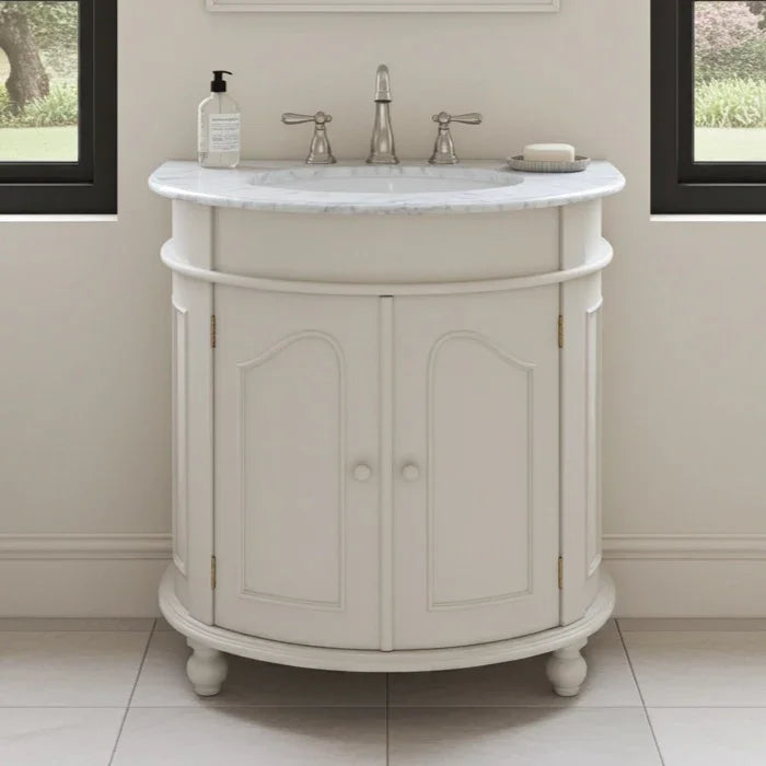 Beige bathroom vanity with sink and cabinets in a bathroom setting