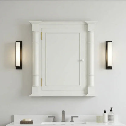 bathroom medicine cabinet, hung above a bathroom sink