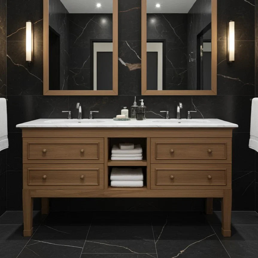 Bathroom vanity with double sink, mirrors, and lighting fixtures against a black marble wall.