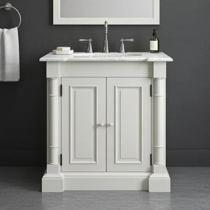White bathroom vanity with marble countertop and sink against a dark gray wall.