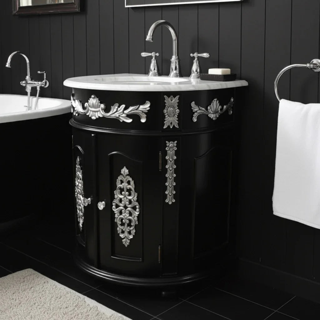 Black bathroom vanity with ornate silver designs in a darkly paneled room.