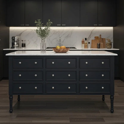 Modern kitchen with dark cabinets, marble backsplash, and a central island.